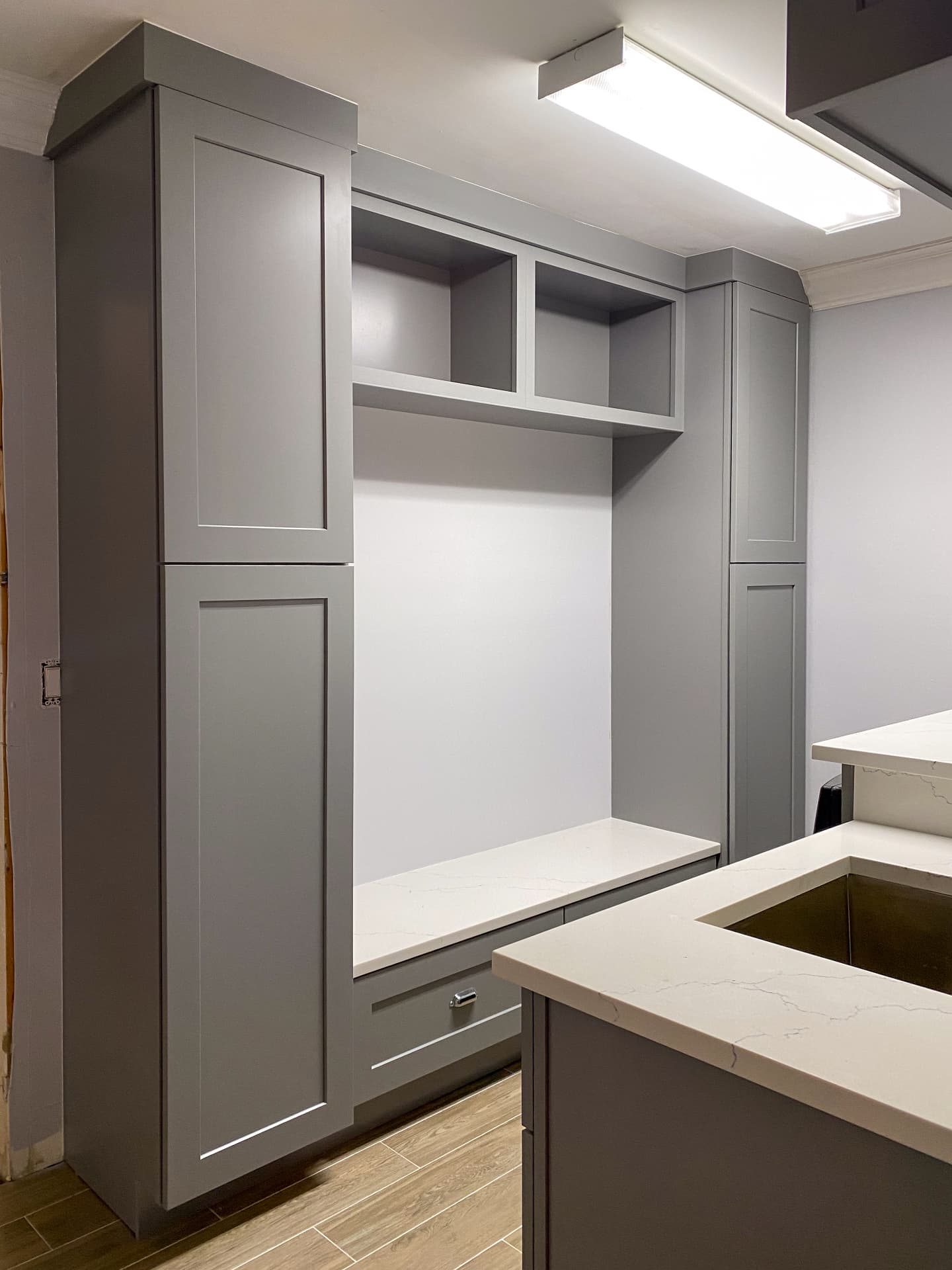 Grey shaker mudroom built-in with bench