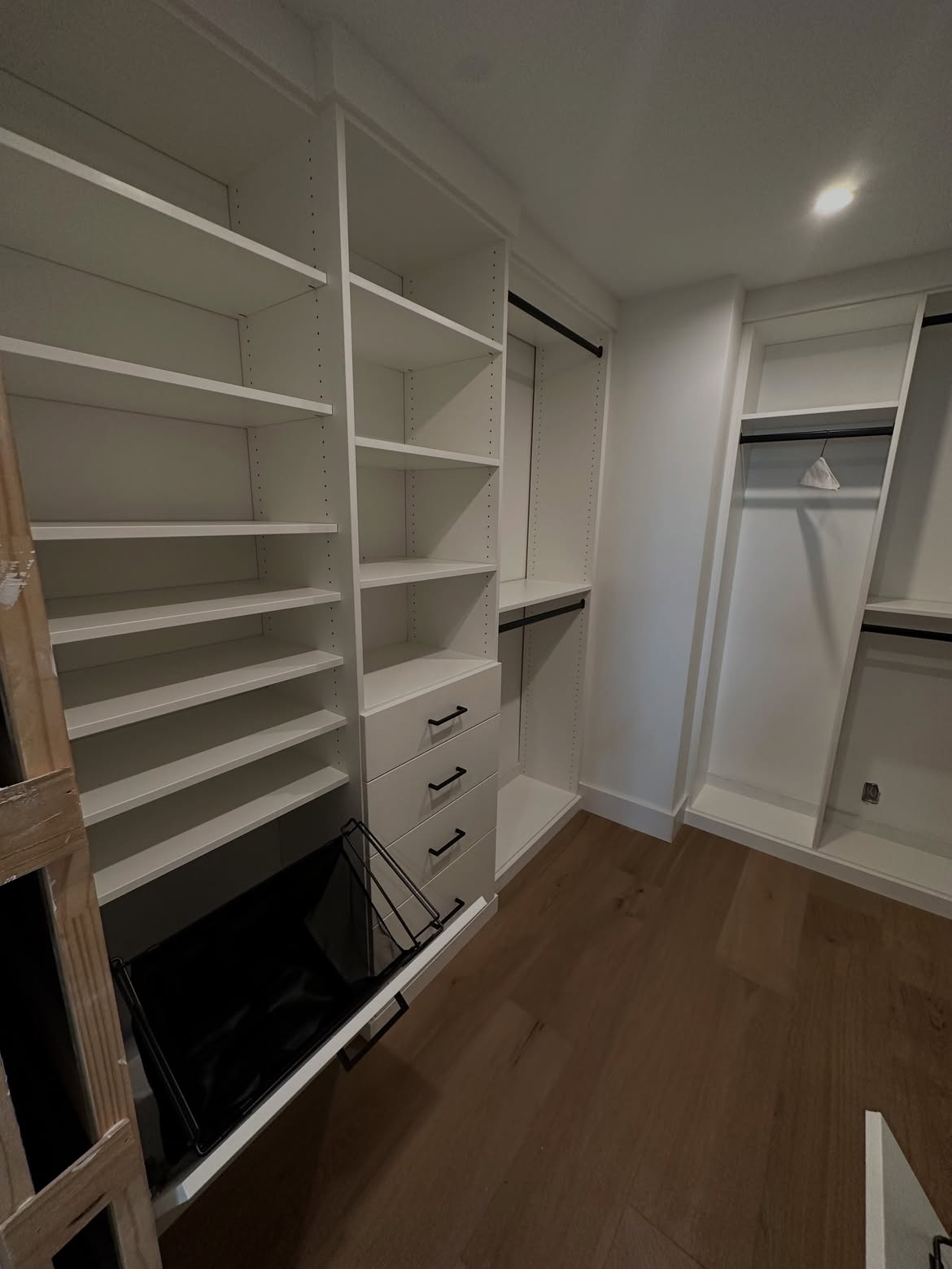Warm oak closet with LED lighting